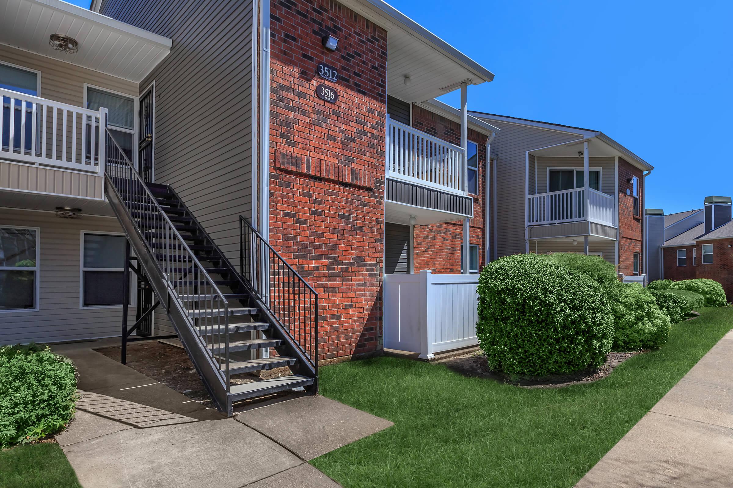 Apartment exterior near the pool area.