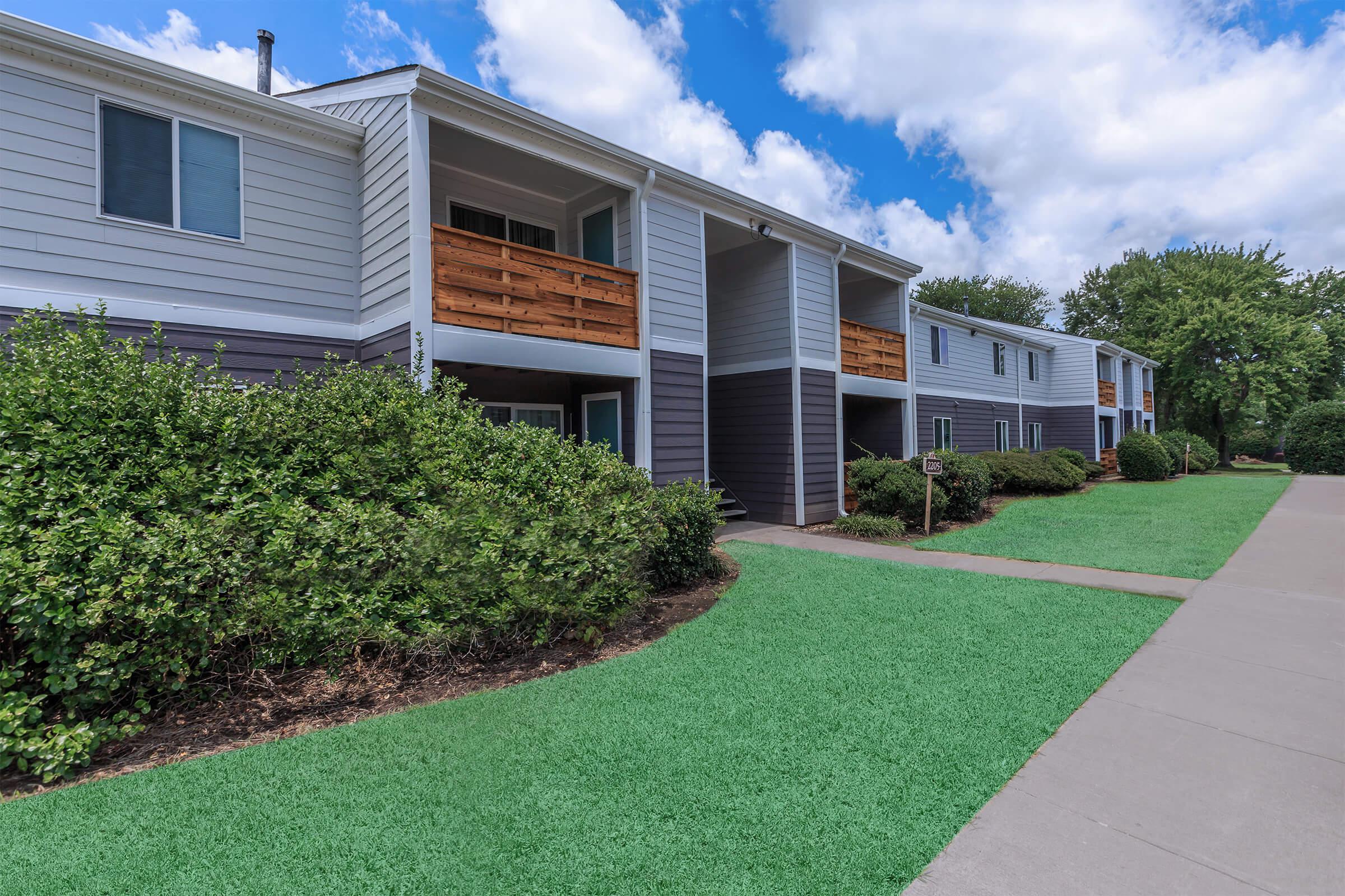 Pathway leading to apartment complex.
