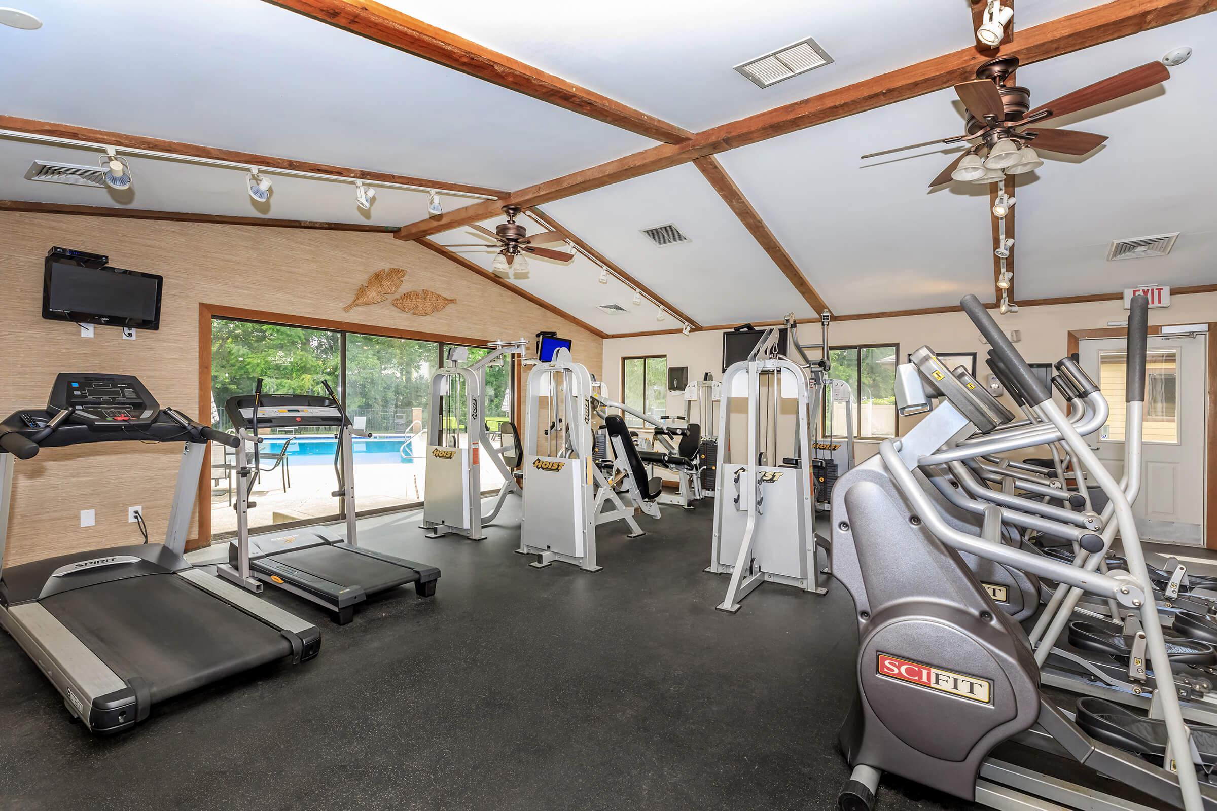 Fitness center with treadmills and other exercise equipment.